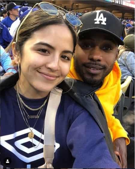 Erin Lim with her boyfriend Joshua Rhodes at a sporting event